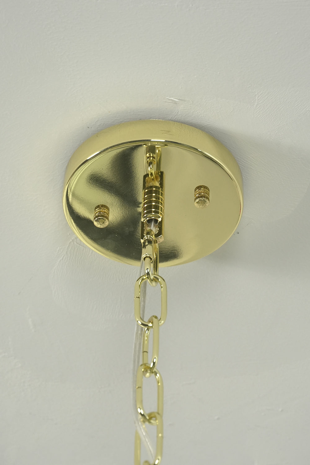 Brass ceiling canopy and chain detail | Metal | Showing functional connection and screws | morylighting