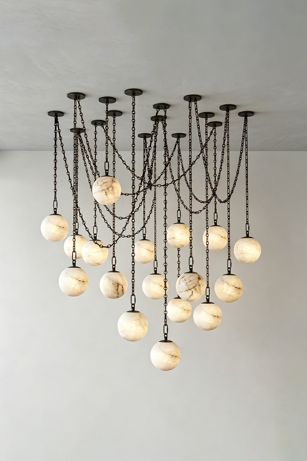 Thalia Alabaster Spherical Chain Chandelier with hand-carved alabaster spheres and brushed links.