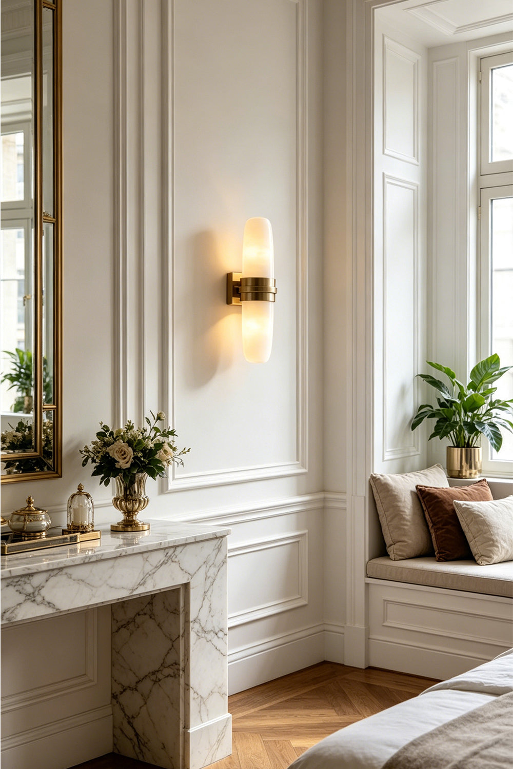 Theron Linear Alabaster Wall Lamp | Alabaster, Metal | Installed on a white paneled feature wall next to an elegant window seating alcove bench | vexa lamps
