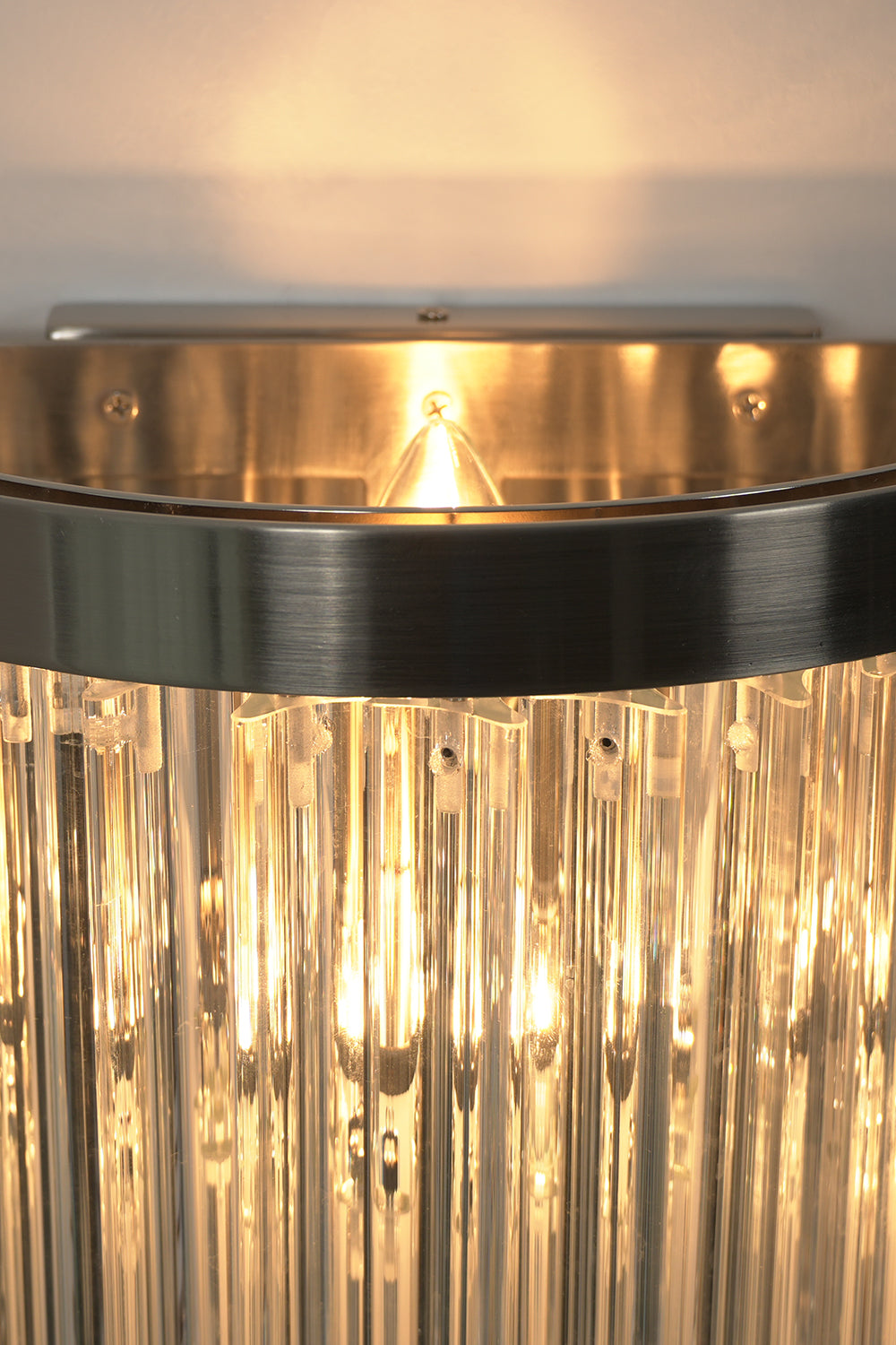 Angled close-up of lit glass rods | Metal, Glass | Detail view showing rod texture | morylighting