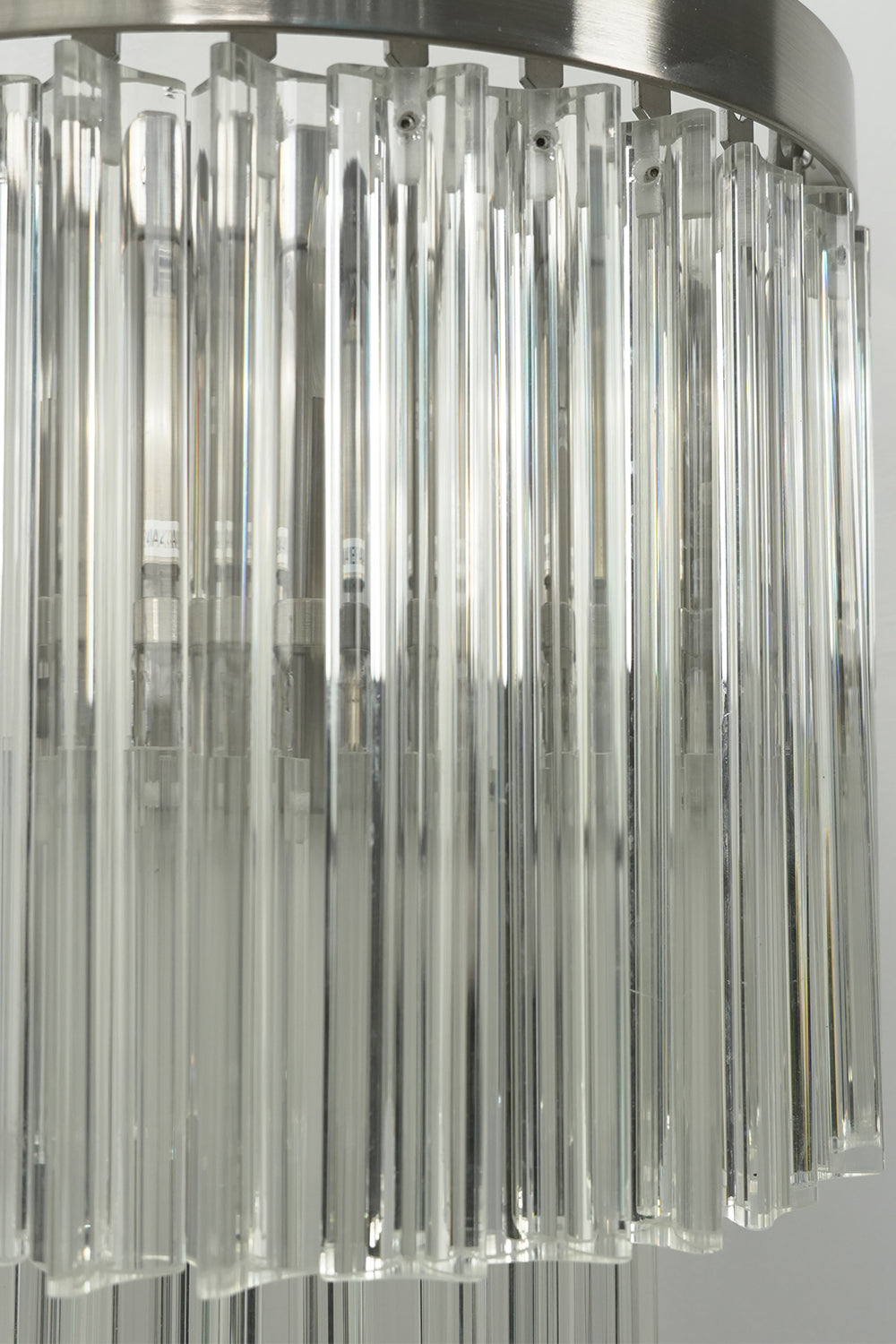 Angled close-up of lit glass rods | Metal, Glass | Detail view showing rod texture | morylighting