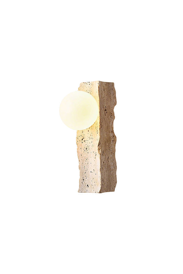 Lit travertine block wall sconce with round glass globe | Yellow Travertine, Metal, Glass | Front view isolated on white background | vexa lamps