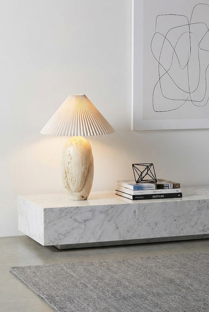 Travertine stone lamp in a modern living room | Travertine, Fabric | On a marble console near minimalist wall art | vexa lamps