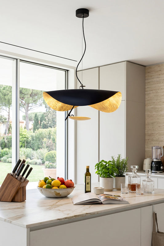 Voluta Horizon Metal Pendant Light | Metal | Black wave pendant light hanging as central lighting over a modern white kitchen island | vexa lamps