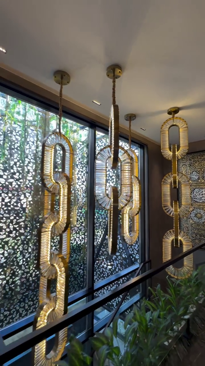 Luxury Crystal and Metal Chain Pendant Chandelier for High Ceilings with Modern Finish